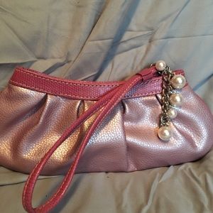 Small cosmetic bag or a wristlet purse